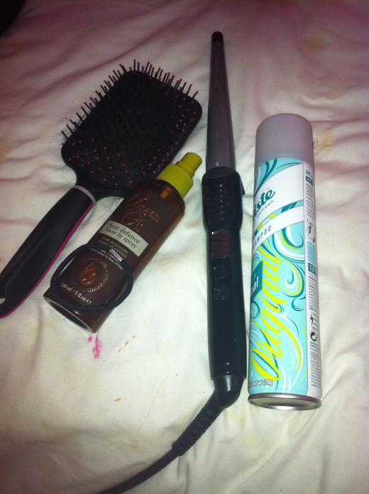 Hairbrush, Curling Wand, Heat Defence Spray, Dry Shampoo, Hair Tie and Hairspray (optional).