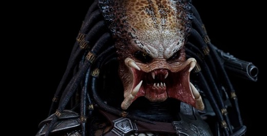 The Predator flashes his pearly whites.