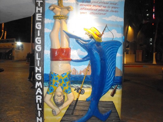 Laugh at fun signs inside and out at the Giggling Marlin. 