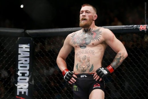 Conor McGregor in the octagon at UFC 196