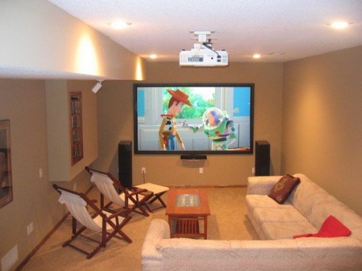 Here is a comfortable (and realistic) home theater that you could establish on a tight budget (providing for Blu-Ray Player, Amplifier, Speakers, Projector, Screen and Cabling).