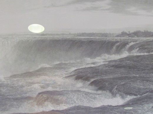 A black and white photo in the lobby of the Sheraton Hotel. Due to my flash from the camera, an image of a sunset is reflected in this photo over the Niagara Falls. 