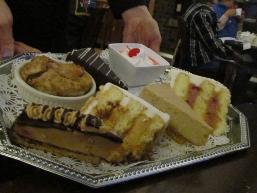 The dessert tray at the Red Coach Inn, was filled with a variety of tantalizing sweets such as Lemon Raspberry Cake, Carmel Swirl Cake, Chocolate and Peanut Butter Cheesecake.   