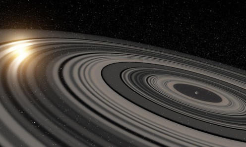 Sí, la pequeña esfera en el medio es el Planeta J1407b. Sí, la pequeña esfera en el medio es el Planeta J1407b.
