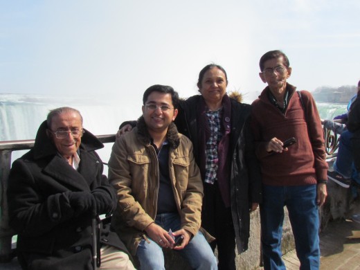 Zain, poses with his family at the Falls. 