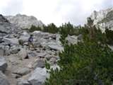 You climb only one step at a time. Boulders are sometimes resting places.