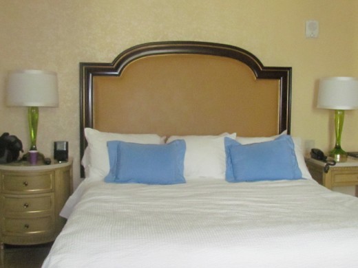 The king size bed in the Executive suite which consist of two queen size beds, another king size Executive suite, refrigerators, large closets, stocked mini bar, three large bathrooms, two sleeper sofas, bath robes and shoes which was included..