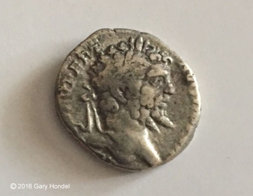 Detail of Silver Denarius Coin with Image of Caesar Augustus
