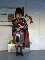 The Scottish Piper pipes  in the Haggis and Cock a Leekie for a typical Burns Night Celebration on the Birthday of the famous Scottish poet.