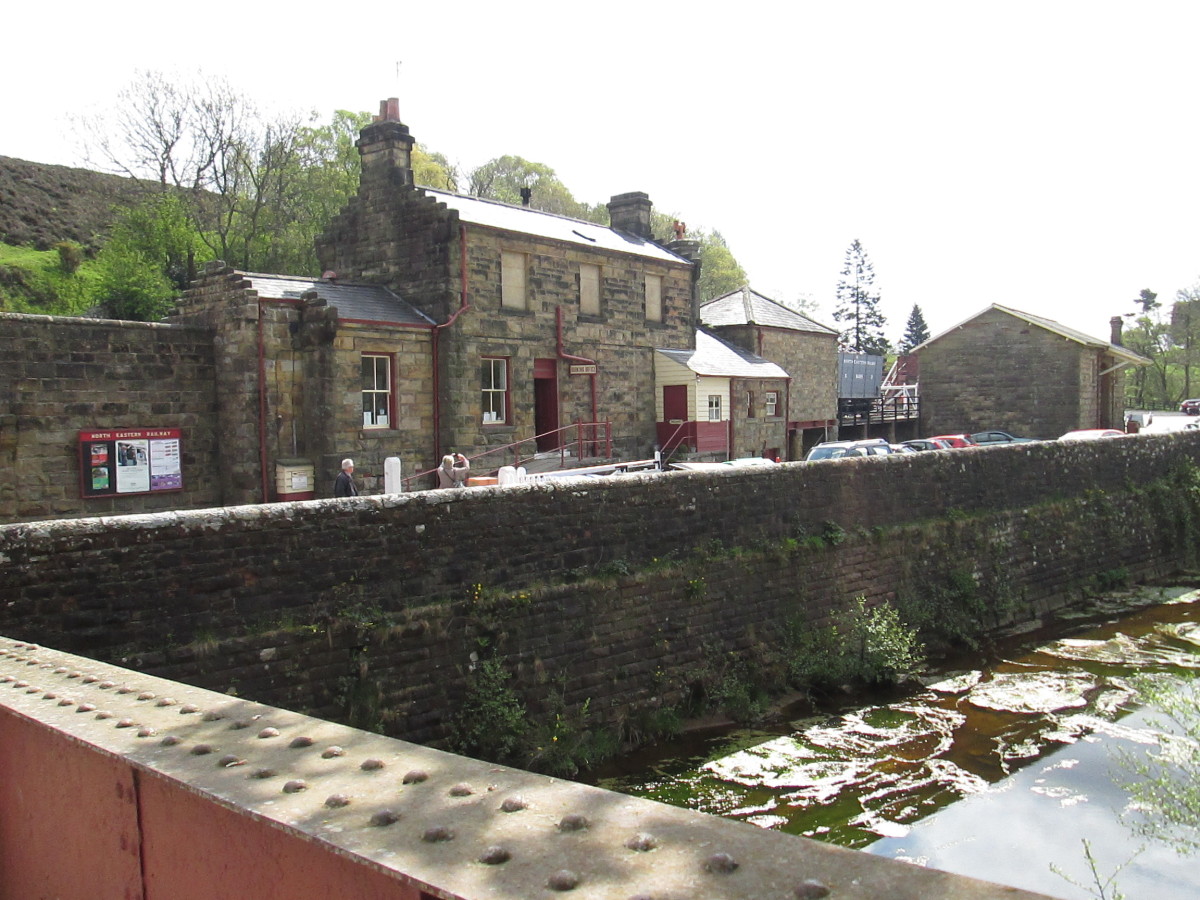Goathland Station from the road, well worth a closer look for its period charm. Sited in the dale bottom, the Goathland Beck passes the station on its way north downhill toward Beck Hole.