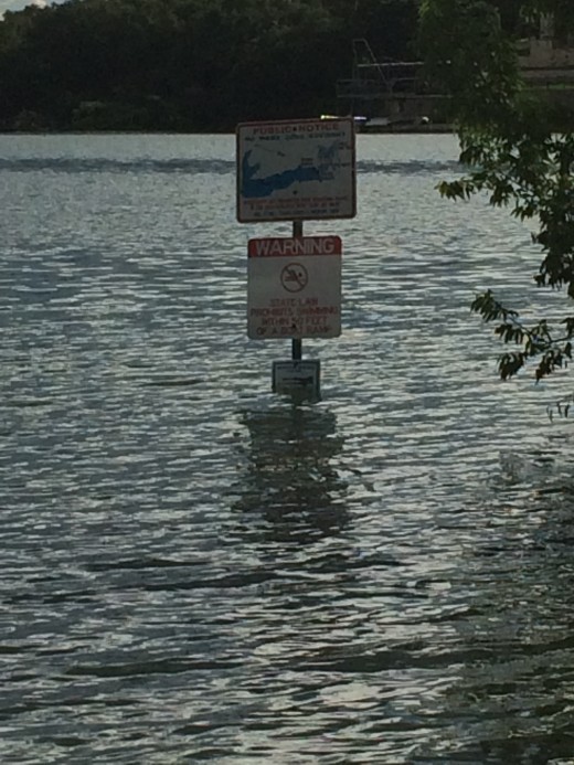 Signs fighting lake levels to be seen.