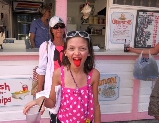 Note the menu on this charming Conch Fritter stand. No, fritters don't actually make your tongue neon pink!