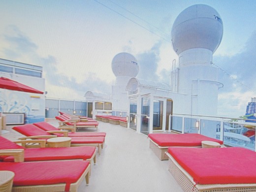 A photo of the upper deck for the purpose of relaxing after a swim.
