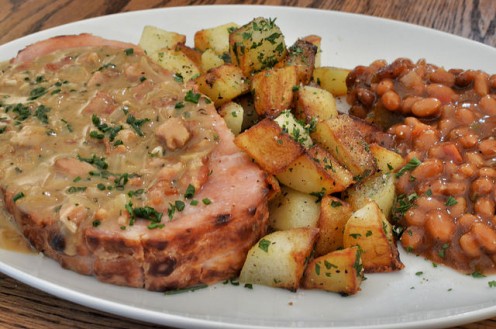 Serving suggestion: ham steak with gravy, home fries, and baked beans.