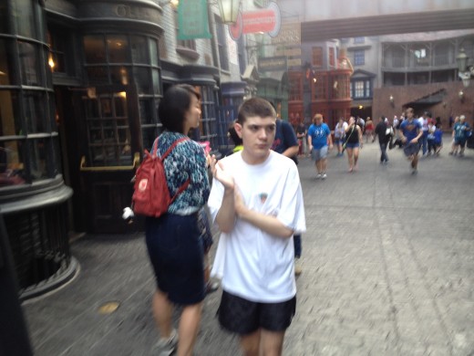 Alex not only took the ferry to Park but ran to the ride Escape from Gringotts.  It was a sweltering 90 degrees but Alex did not care except he was perspiring.