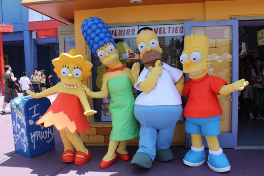 The family posing outside of a made-over Kwik-e-Mart to welcome customers to the gift shop at Universal Studios in Florida. 
