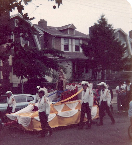 Knights of Columbus taking float down 63rd Street, Brooklyn, NY, 1979.