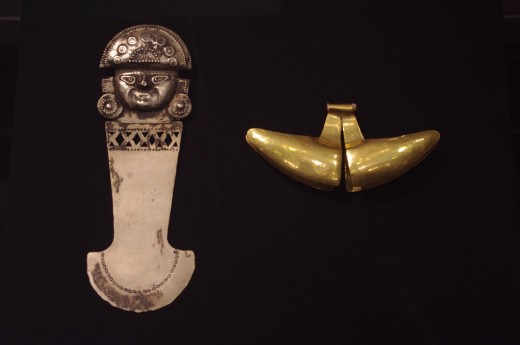 (left) "Ceremonial Knife (Tumi)" Made of silver alloy. That's a knife? Ok Mr. Walters I'll take your word for it... Not that THAT's worth anything. (left) "Ornament" of Moche (Early Intermediate, 100 BC-600 AD). Made of gold alloy. 