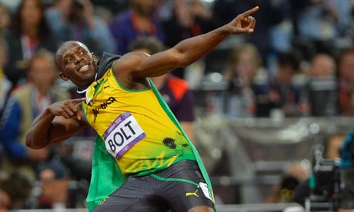 Usain Bolt points to his secret (alleged) cell phone stash in the sky.