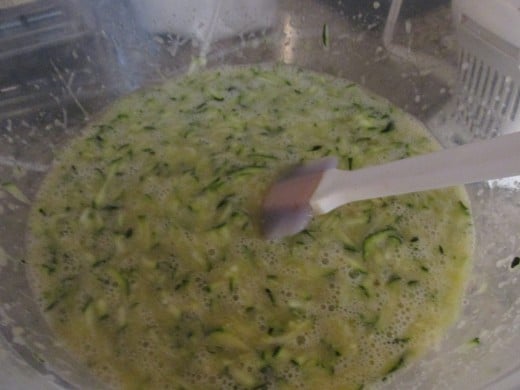 Zucchini mixed in with the wet ingredients