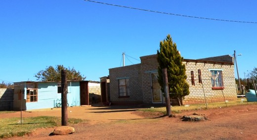 Poor providing shelter for poor relatives, South Africa 