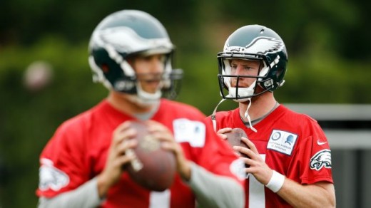 At least Sam Bradford (L) won't have to look over his shoulder for Carson Wentz (R) in Minnesota
