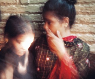 These young victims of human trafficking are seen in the doorway of a brothel in South Asia, during a rescue operation conducted by International Justice Mission (IJM). Photo copyright: IJM