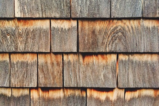 Cedar is the best wood material for a dog house.