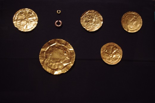 "Five Pectoral Ornaments" (700-1520 CE). Made of gold or gold alloy. and "Two Nose Rings" (Before 1500 CE). Made of gold. What no chokers? Pretty sure the Spaniards had chokers.... oh wait...