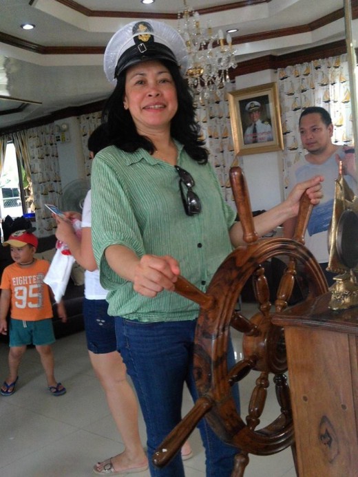 My Tita manning the wheel.