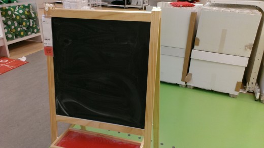 The blackboard is still an effective way of teaching kids words.  Write them down.