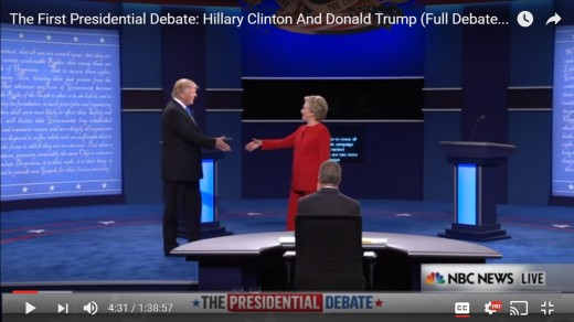HRC moves her upper body away from the handshake as she steps in with her right foot. HRC passes center stage and is now on DJT's side of the stage. DJT's body remains square and hand opens more for a handshake.