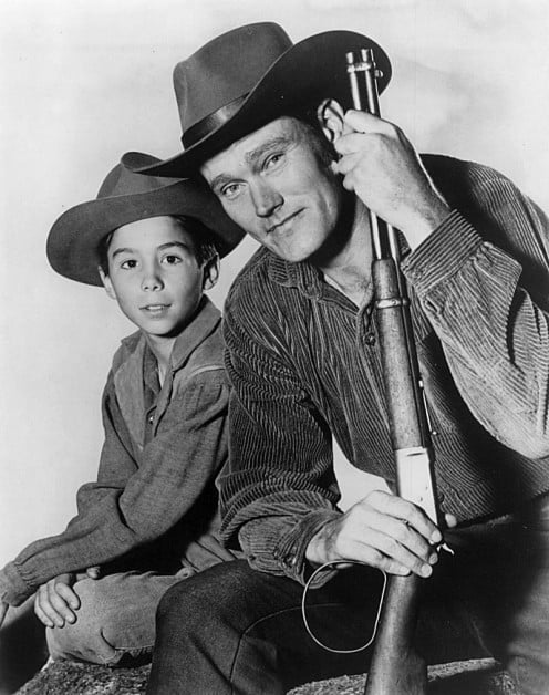 Johnny Crawford as Mark  McCain and Chuck Connors  as Lucas McCain his father  on The Rifleman