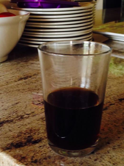 Nothing fancy here; black morning coffee, already half drunk, served Russian Samovar style, in a voluminous glass.