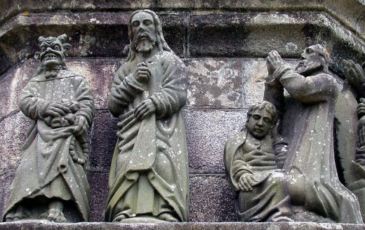  A depiction of Satan tempting Jesus and offering him bread, by Bastien Prigent. The Calvary at Plougonven, Brittany, France 