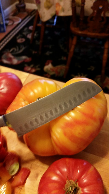 Mr. Stripey tomato and wondering if I have a knife big enough to cut this thing!