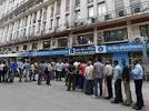 The Exhausting Queues Outside Banks