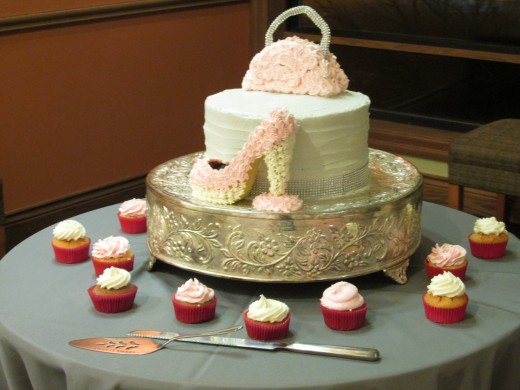 A photo of the beautiful cake which was in the form of a pump and purse. 