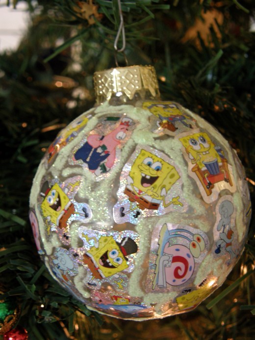 My youngest son made this ornament when he was in Kindergarten.  It is simply made from stickers, and we love it.