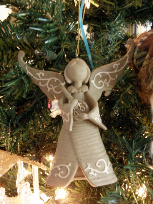 This ornament is a reminded of so many of our family members who are now angels.
