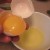 Allow the egg white to drain out of half of the shell into a separate container while keeping the yolk in the shell. Allow the egg white to drain out of half of the shell into a separate container while keeping the yolk in the shell.