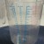 Plastic graduated measuring cup with cup measurement gradation and its equivalent in fluid ounces gradation.