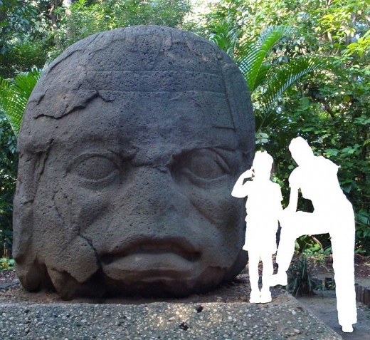 Monument 4 from La Venta with comparative size of an adult and child. The monument weighs almost 20 tons.
