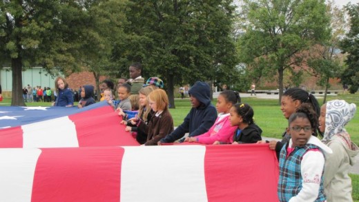 Field trip of children learning about the American Flag at fort McHenry.