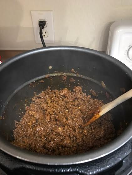 Brown ground beef and onions
