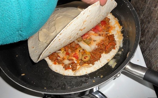 Add second buttered wrap to top