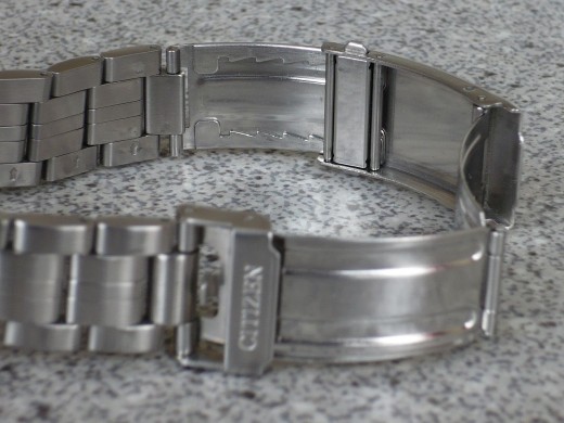 Keep the old watch and wear the new one.