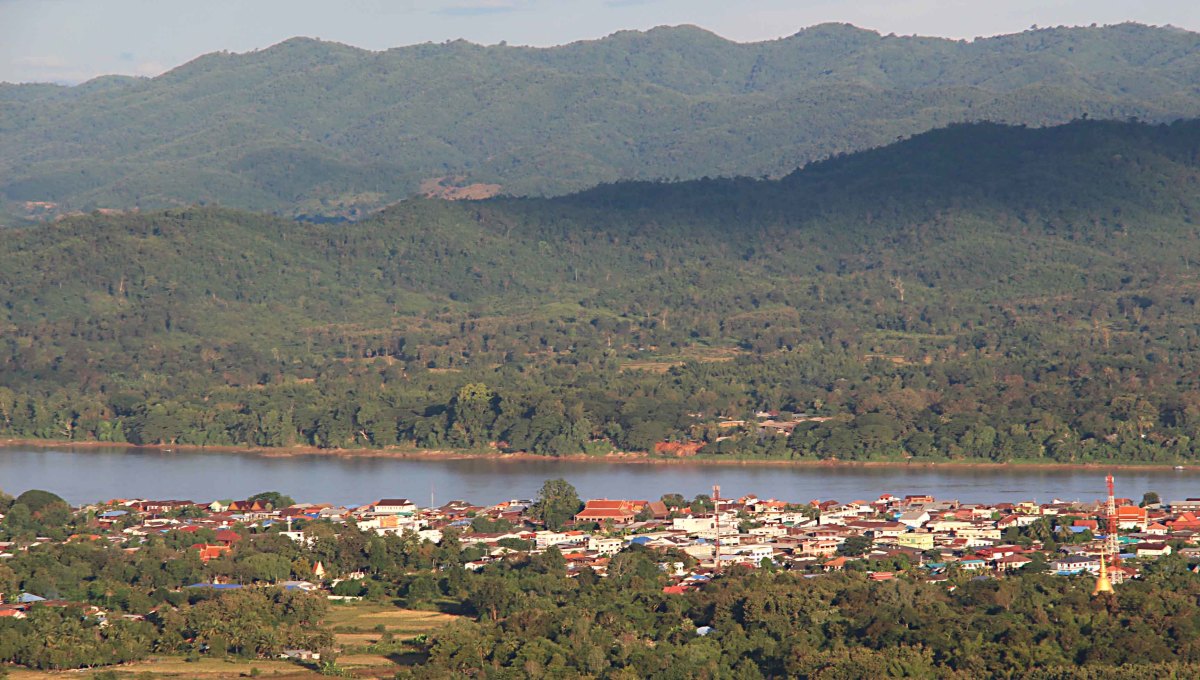Chiang Khan shortly after sunrise with the Mekong and Laos in the background - photographed from Phu Thok Hill.