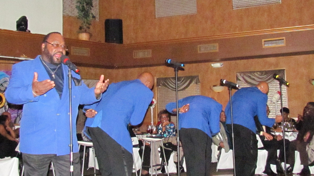 The Blue Notes featured Sugar Bear, get down with their steps during this powerful performance.