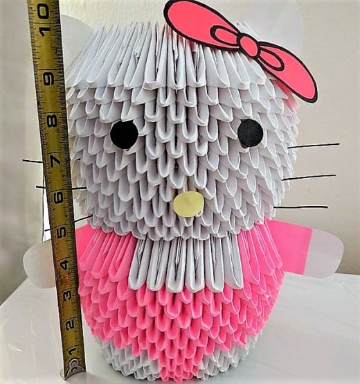 This hello kitty is about 10 inches tall and 6 inches wide.
